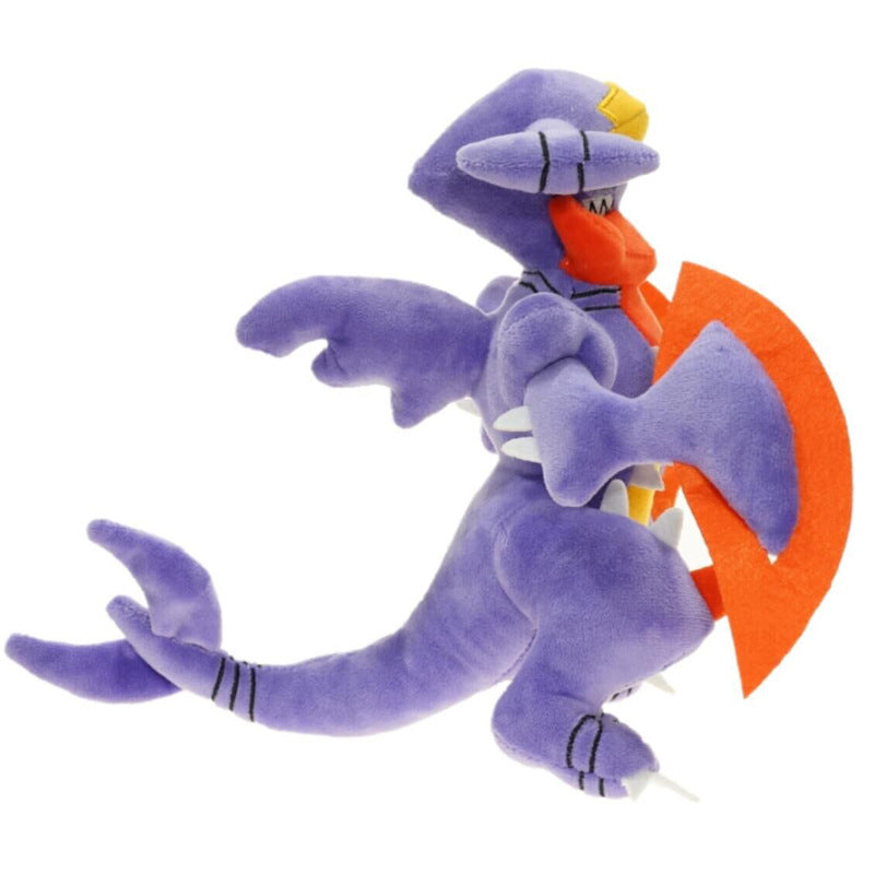 Pokemon Garchomp Plush Toy – Garchomp, Gabite & Gible Stuffed Animal Plush toy of a purple dragon-like creature with orange wings on a white background
