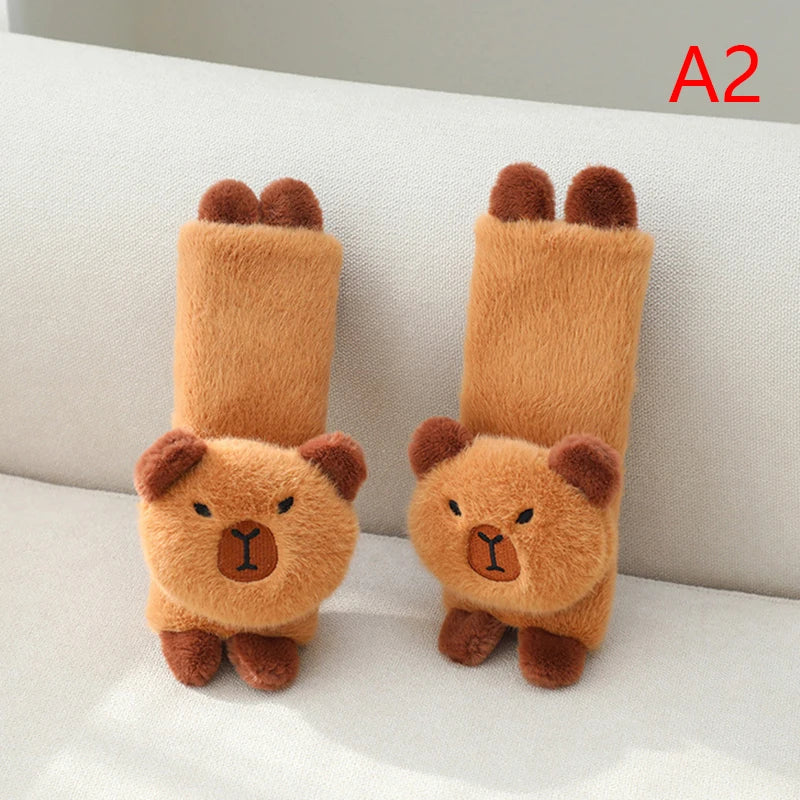 Capybara Car Headrest Neck Pillow & Tissue Holder – Plush Car Decor Two brown bear-shaped socks on a white surface with a gray background.