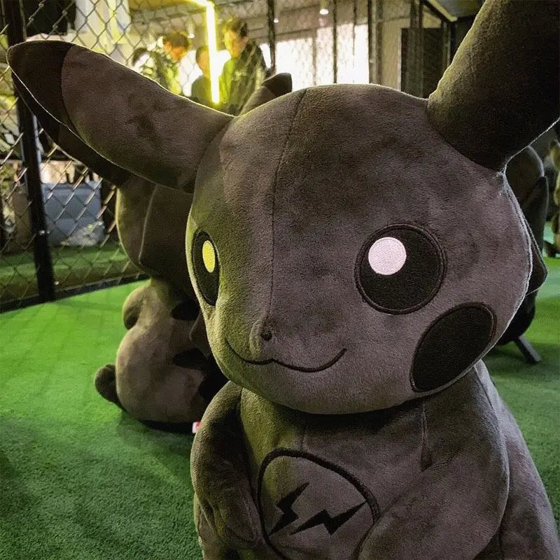 Dark Pikachu Plush Pillow Black Kawaii Doll Plush toy resembling a character with large ears and a lightning bolt symbol on a green surface.