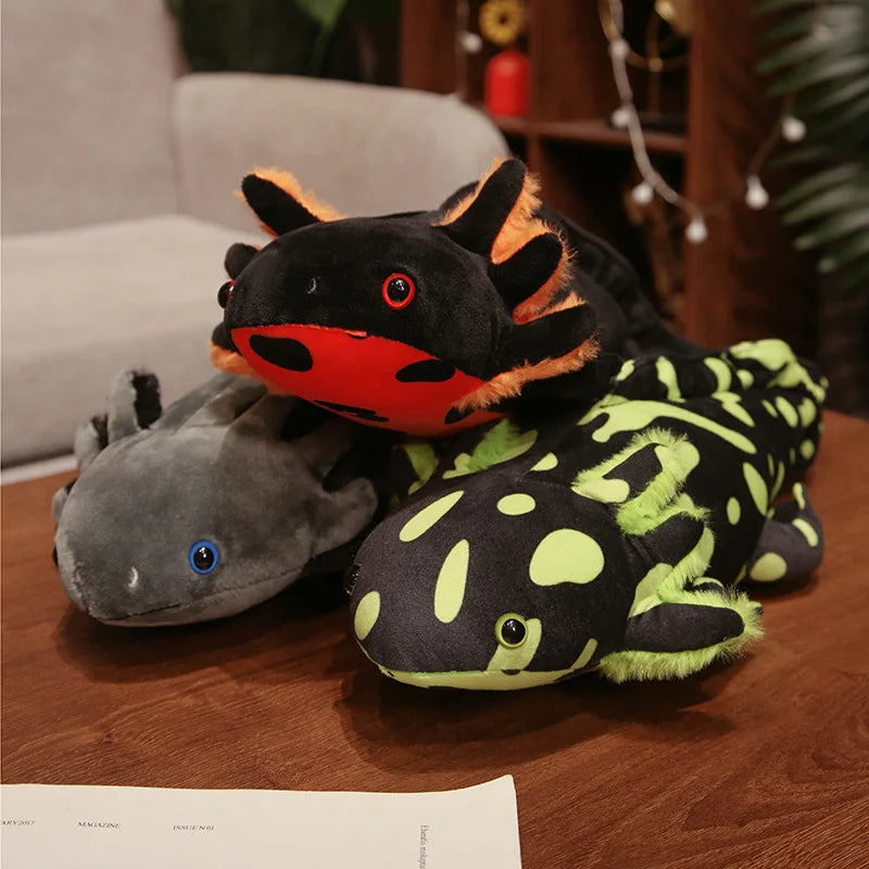Cute Axolotl Plush Toy – Squishmallow Salamander Stuffed Animal Three plush axolotls on a wooden surface with a blurred indoor background