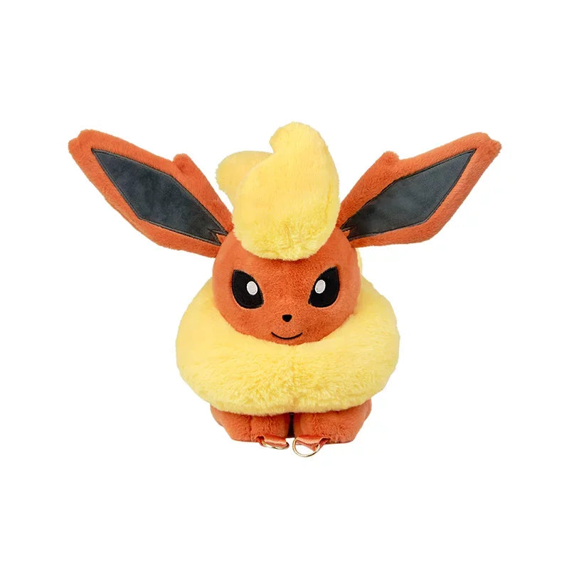 Pokemon Eevee Evolution Plush Crossbody Bag A plush toy of Flareon from the Pokémon franchise, featuring its signature orange and yellow color scheme with black inner ears, set against a plain white background.