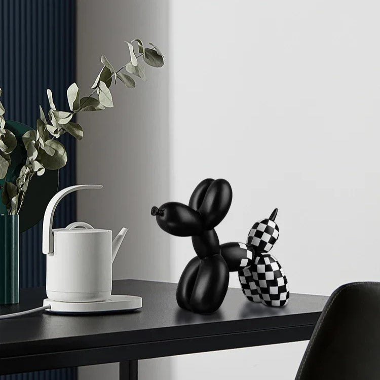 Balloon Dog Sculpture Decor – Cute Animal Home Accent for Living Room Decorative black balloon dog sculpture on a table with a white teapot and plant.