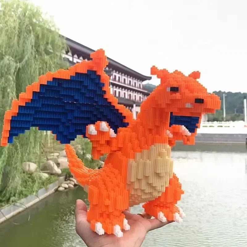 Pokemon Fire-Breathing Dragon Building Blocks – Model Brick Toy Orange and blue dragon-like figure made of interlocking bricks held in front of a scenic background.