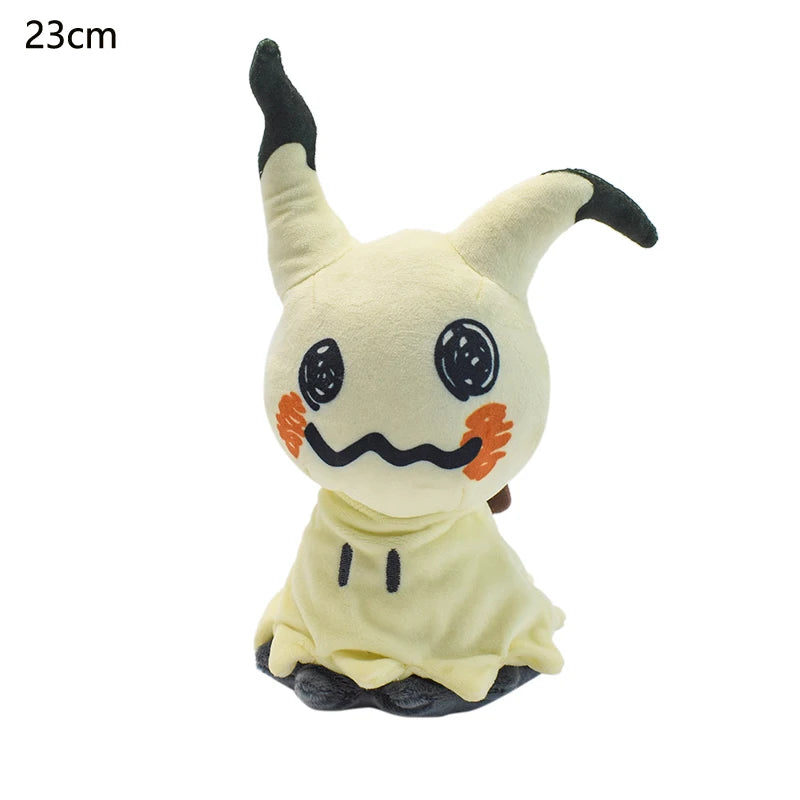 Pokemon Mimikyu Plush – Shiny Stuffed Toy A 23cm Pikachu plush toy dressed in a yellow hoodie, featuring black-tipped ears, black stitched eyes and mouth, and orange cheek accents, shown on a white background with '23cm' text in the top-left corner.