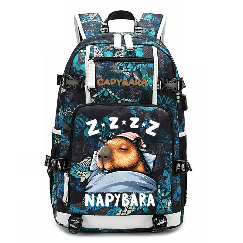 Capybara Backpack – Large Capacity Lightweight School Bag A backpack featuring a sleeping beaver illustration with 'Z Z Z' and 'NAPYBARA' text on the front pocket, set against a blue and black patterned background with white accents.