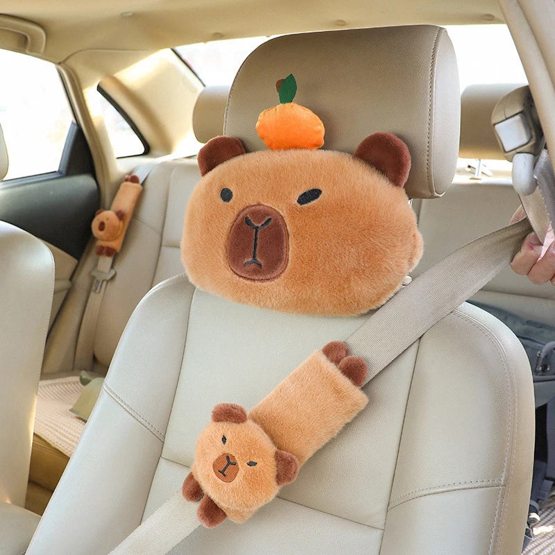 Capybara Car Headrest Neck Pillow & Tissue Holder – Plush Car Decor Plush bear headrest cover and seat belt cover in a car interior