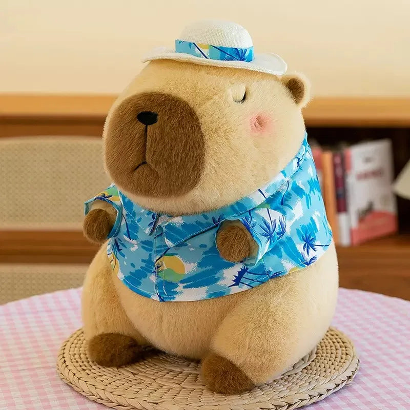 Green Banana Capybara Plush Toy – Cute Kawaii Stuffed Animal Plush teddy bear wearing a blue floral shirt and hat on a checkered tablecloth.