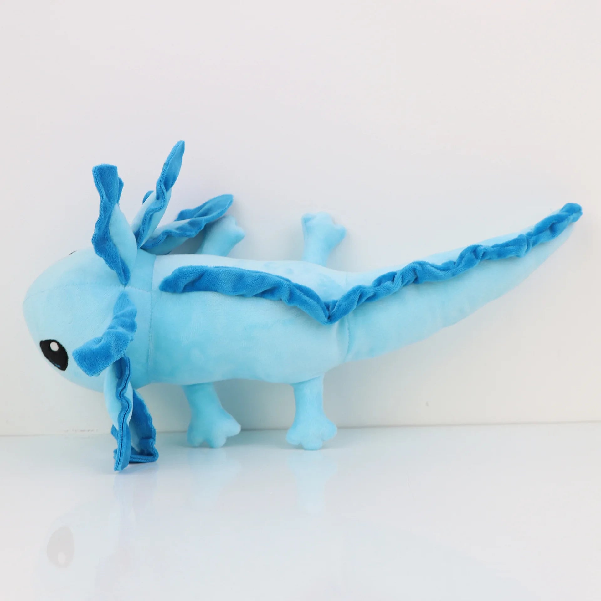 Axolotl Squishmallow Plush Toy – Soft Stuffed Animal Blue plush toy dragon on a white background