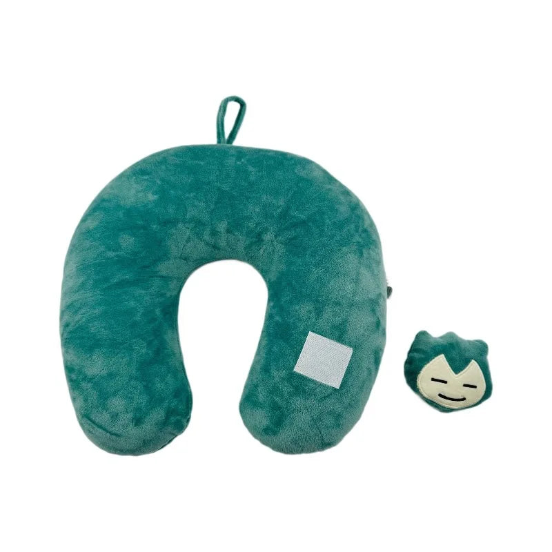 Pokemon Furret, Dratini & Snorlax Plush Neck Pillow A teal green U-shaped travel neck pillow with a matching small plush character accessory, shown on a plain white background.