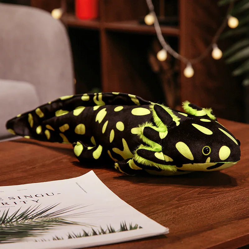 Cute Axolotl Plush Toy – Squishmallow Salamander Stuffed Animal Plush axolotl toy on a wooden surface with a magazine underneath
