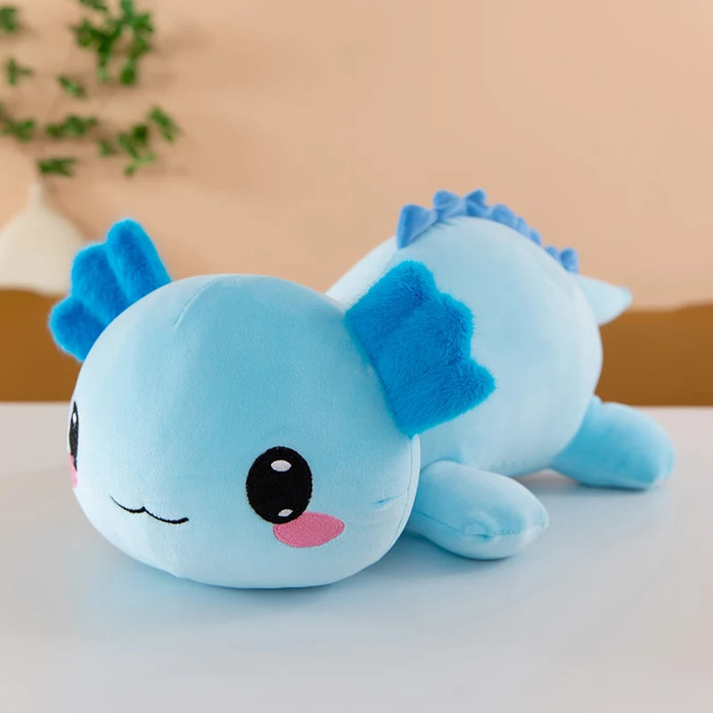 Axolotl Squishmallow Plush – Stuffed Animal Toy Blue plush toy with a happy expression on a light surface.