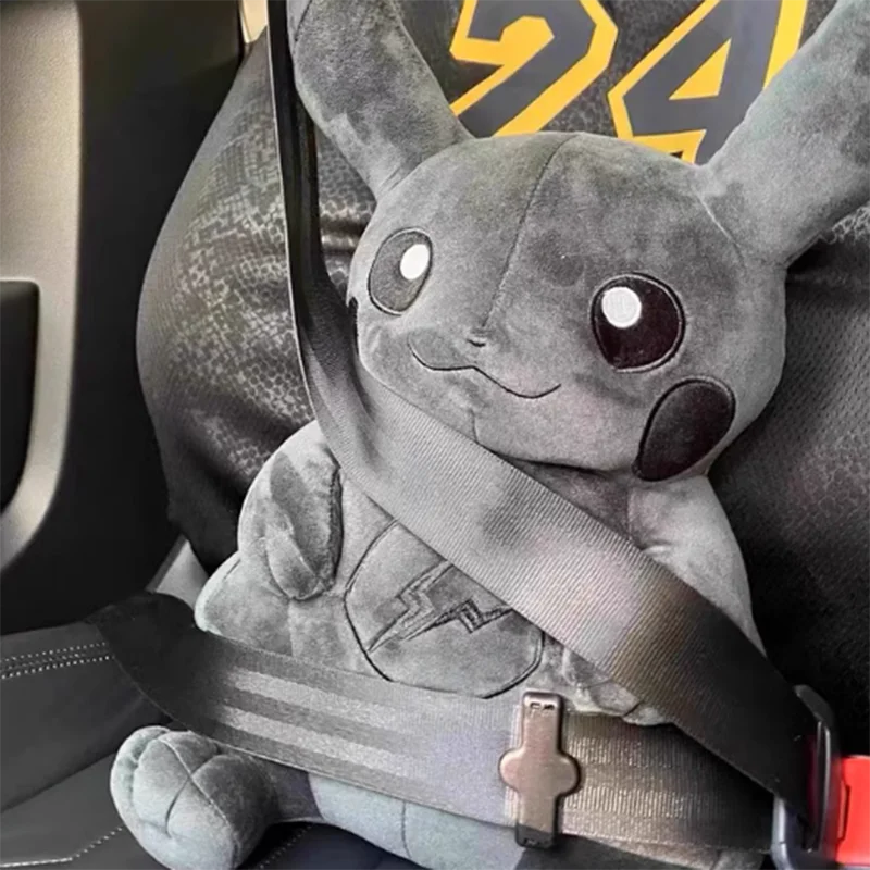 Dark Pikachu Plush Pillow Black Kawaii Doll Gray plush toy with a seatbelt in a car interior