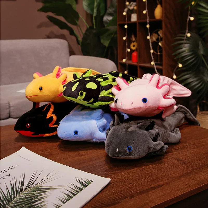 Cute Axolotl Plush Toy – Squishmallow Salamander Stuffed Animal Colorful axolotl plush toys on a wooden surface with a cozy indoor background.