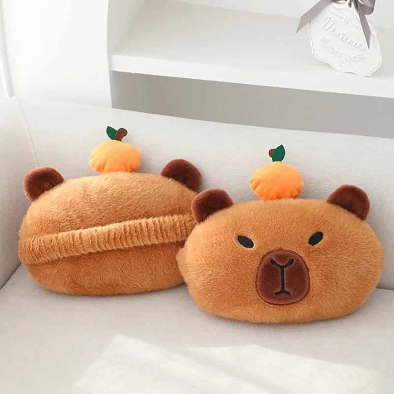 Capybara Car Headrest Neck Pillow & Tissue Holder – Plush Car Decor Two bear-shaped cushions with pumpkin ears on a white surface.
