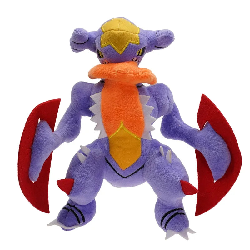 Pokemon Garchomp Plush Toy – Garchomp, Gabite & Gible Stuffed Animal Plush toy of a purple and orange creature with red accents on a white background