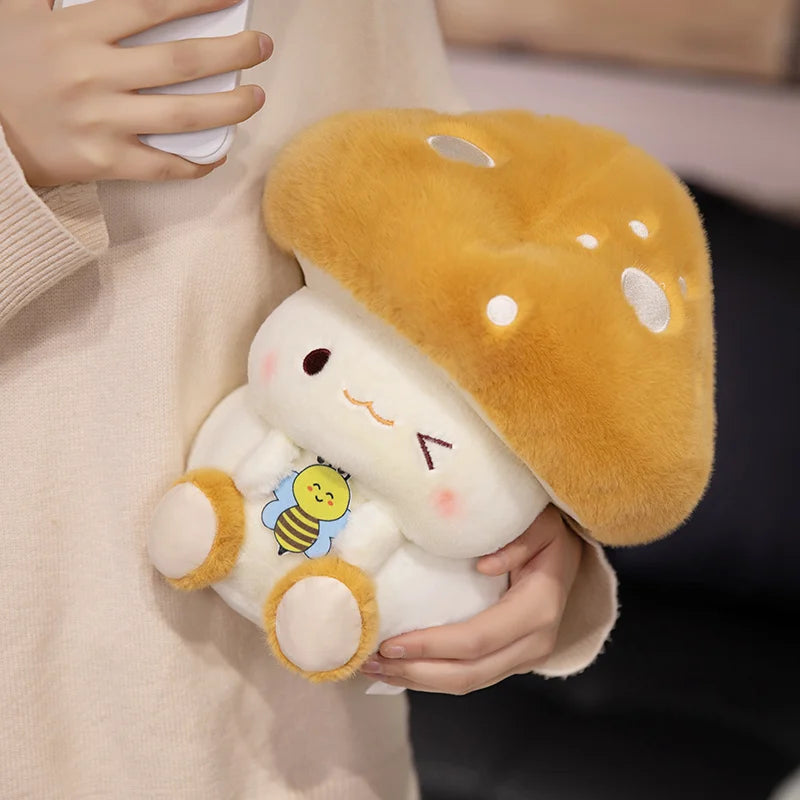 Creative Mushroom Plush Pillow – Cute Stuffed Plant Cushion for Home Décor Plush toy shaped like a mushroom with a cute face held by a person