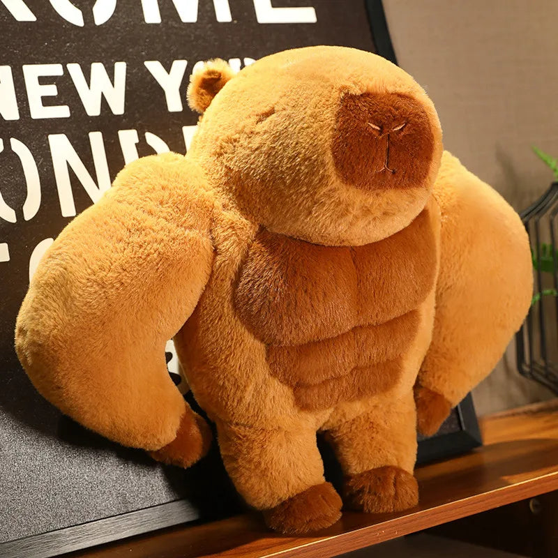 Muscle Capybara Plush Pillow – Funny Brown Stuffed Animal Cushion Muscular teddy bear plush toy on a shelf with a blurred background