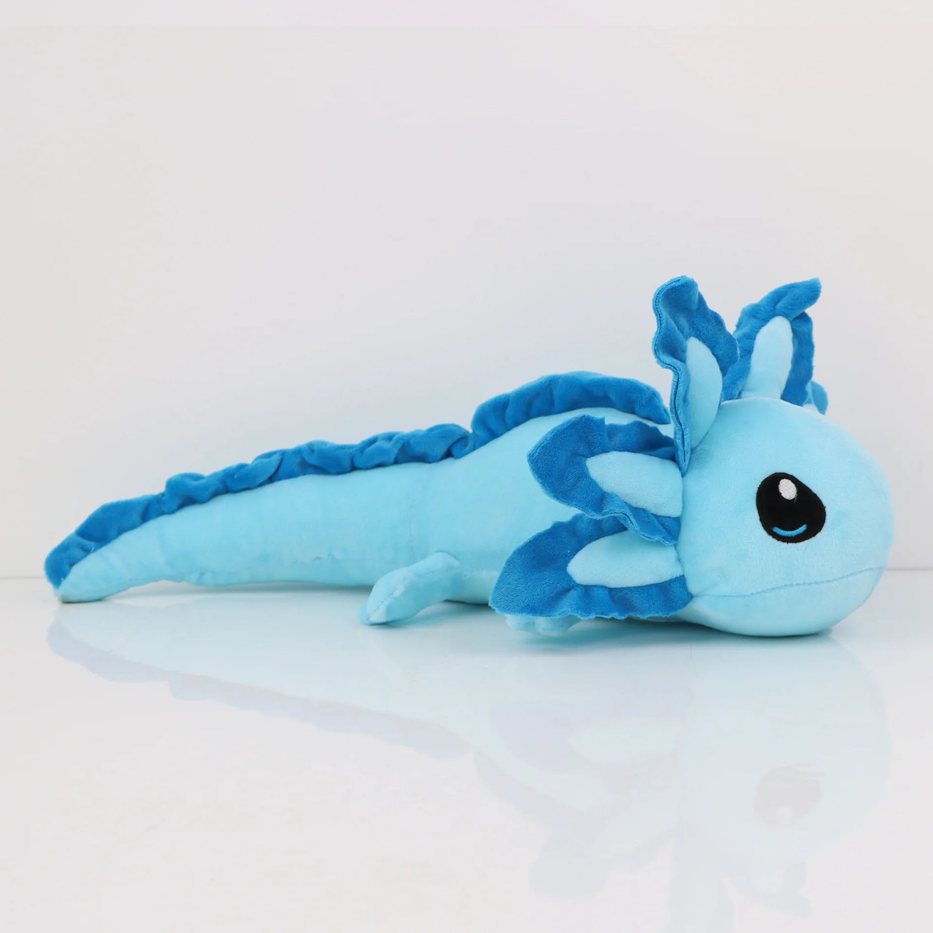 Axolotl Squishmallow Plush Toy – Soft Stuffed Animal Blue axolotl plush toy on a white background