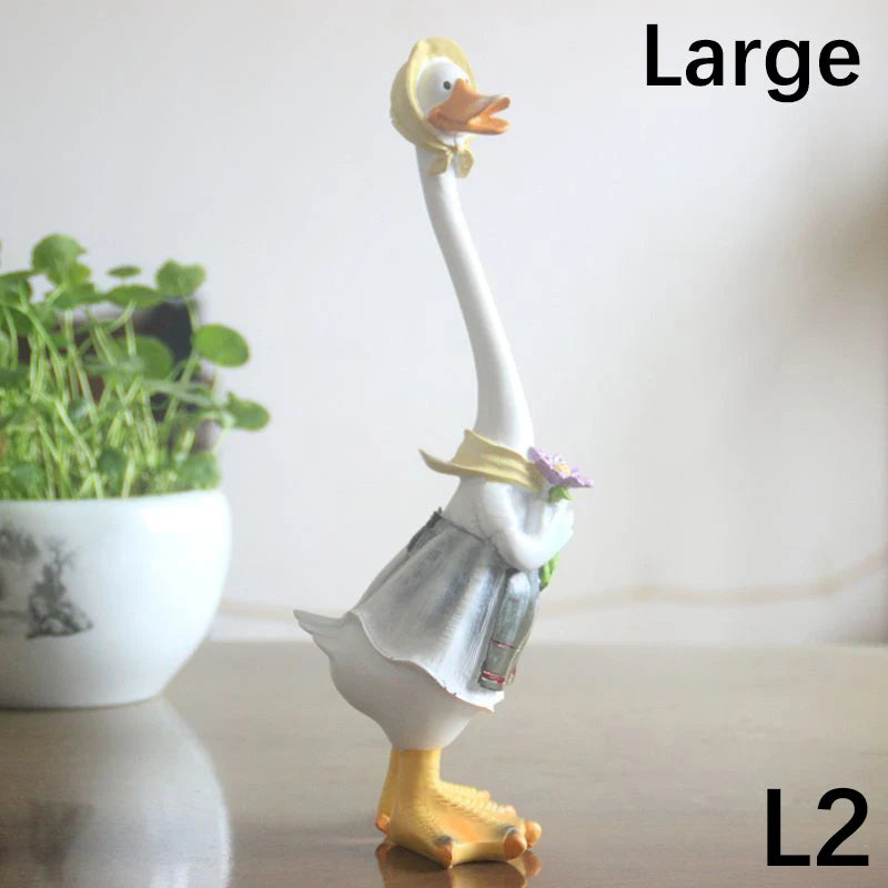 Resin Duck Family Garden Statue – Animal Outdoor Decor Sculpture Large duck-shaped bottle holder with a plant in the background