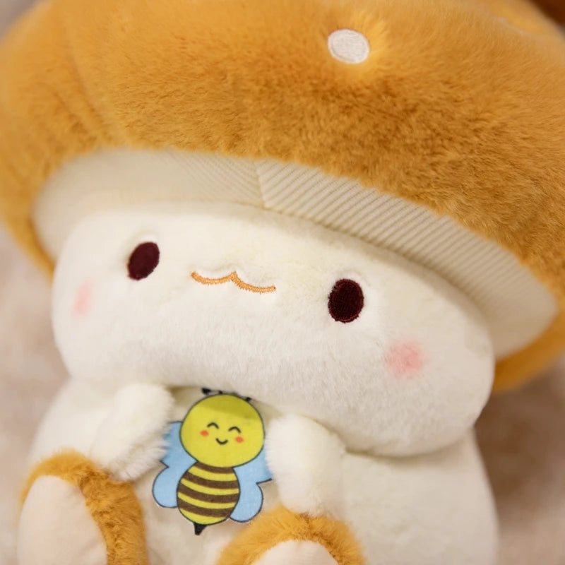 Creative Mushroom Plush Pillow – Cute Stuffed Plant Cushion for Home Décor Plush toy resembling a mushroom with a bee design on its shirt