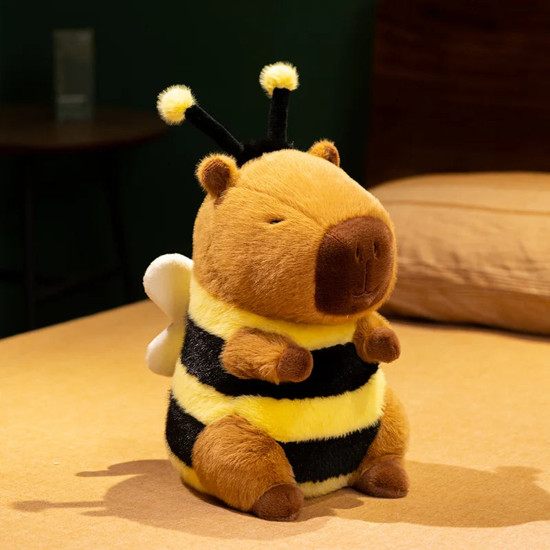 Bee Capybara Plush Toy – Kawaii Soft Stuffed Animal Plush toy bee sitting on a surface with a blurred background