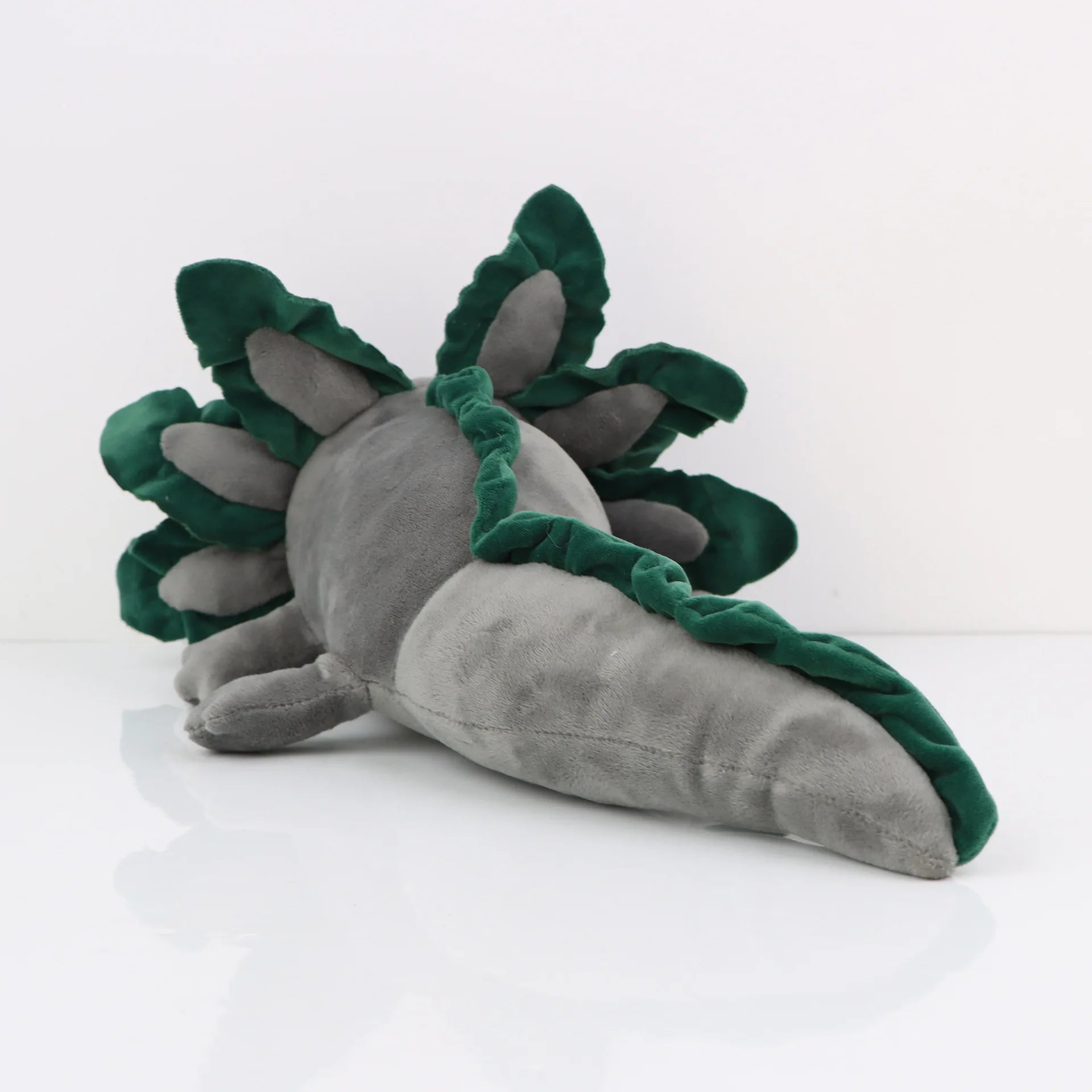Axolotl Squishmallow Plush Toy – Soft Stuffed Animal Plush toy resembling a dragon with green wings on a white background