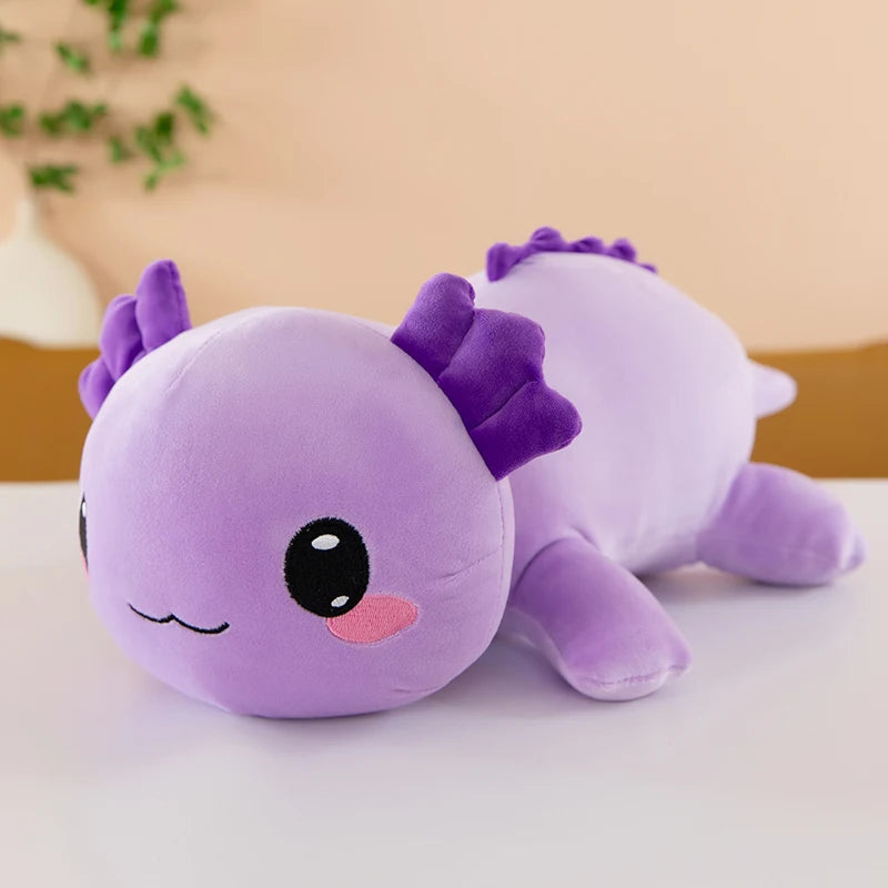 Axolotl Squishmallow Plush – Stuffed Animal Toy Purple plush toy with a cute face on a white surface