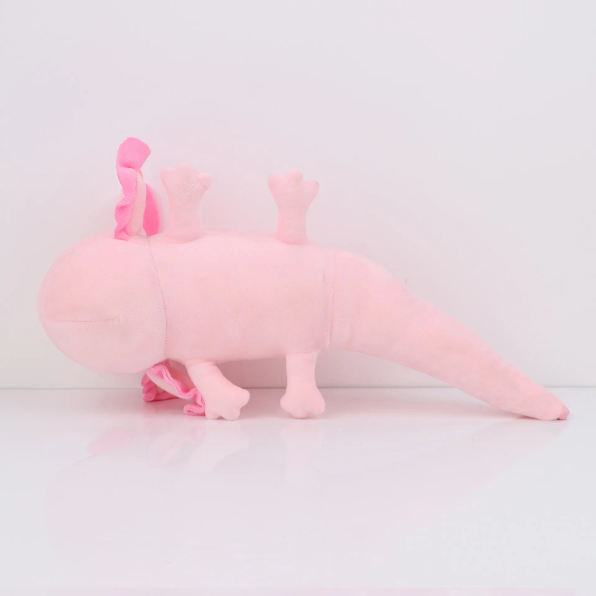 Axolotl Squishmallow Plush Toy – Soft Stuffed Animal Pink axolotl plush toy on a light gray background