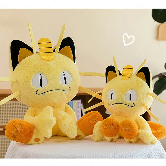 Pokemon Meowth Plush Toy – Giant Cute Stuffed Animal Pillow Two plush toys resembling a cartoon character with yellow fur and black ears on a light-colored surface.