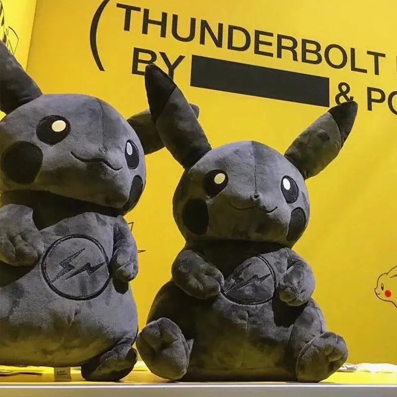 Dark Pikachu Plush Pillow Black Kawaii Doll Two plush toys resembling a character from 'Pokémon' on a yellow background with 'Thunderbolt' branding.