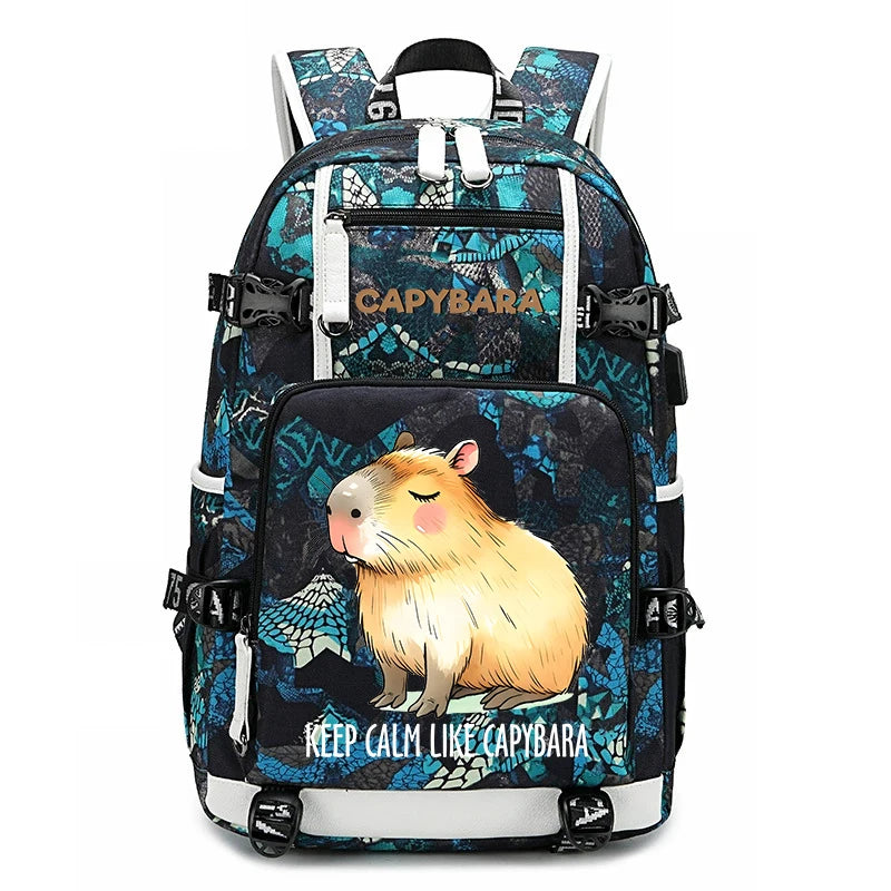 Capybara Backpack – Large Capacity Lightweight School Bag A backpack featuring a capybara illustration on the front pocket, with a blue and black patterned design and the text 'CAPYBARA' and 'KEEP CALM LIKE CAPYBARA'.