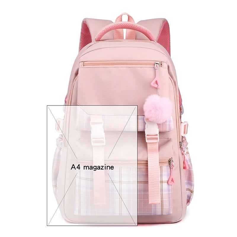 Capybara Bubble Tea Backpack – School Bag for Teens A pink school backpack with a plaid pattern on the lower pocket, featuring a pink pom-pom charm, a zippered A4 magazine pocket, and a top carry handle, shown on a white background with an inset graphic demonstrating the A4 size.