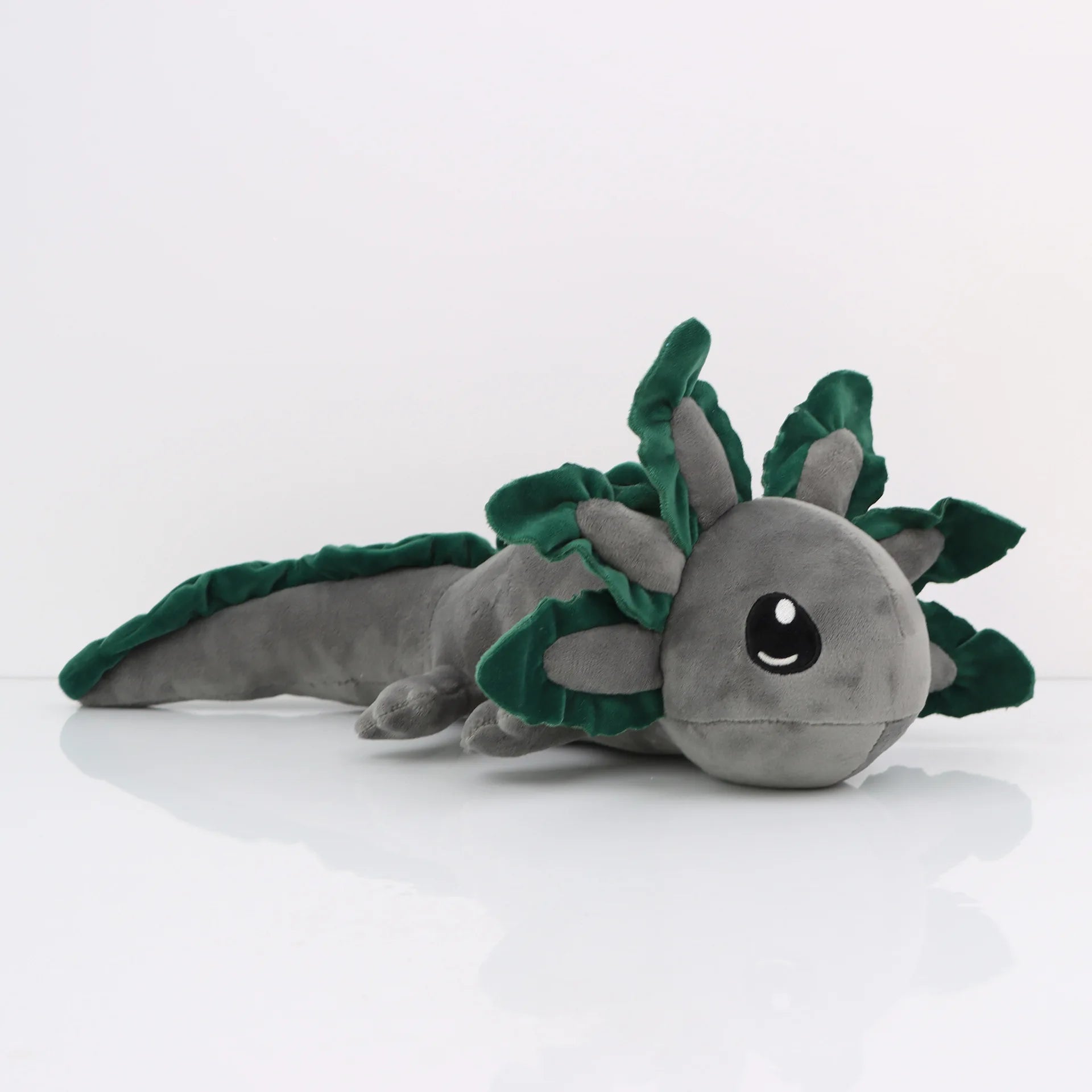 Axolotl Squishmallow Plush Toy – Soft Stuffed Animal Plush toy axolotl with green leaf-like appendages on a white background