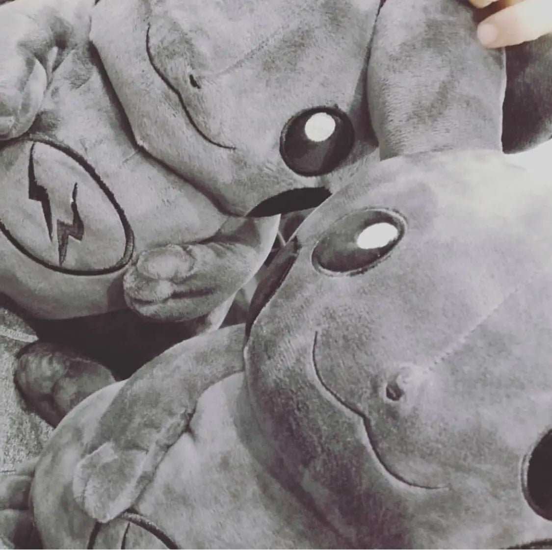Dark Pikachu Plush Pillow Black Kawaii Doll Close-up of a plush toy resembling a character from a popular culture franchise.