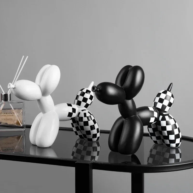 Balloon Dog Sculpture Decor – Cute Animal Home Accent for Living Room Black and white balloon dog sculptures on a reflective surface with a gray background