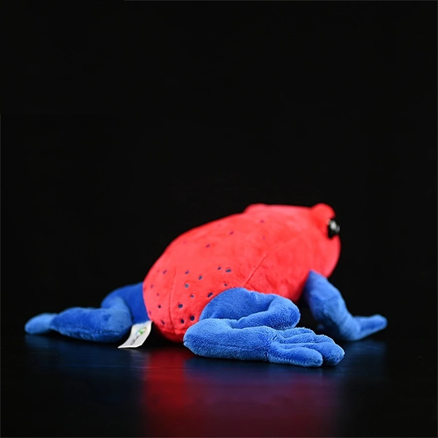 Strawberry Dart Frog Plush Toy – Lifelike Red Frog Stuffed Animal Red and blue plush toy on a black background