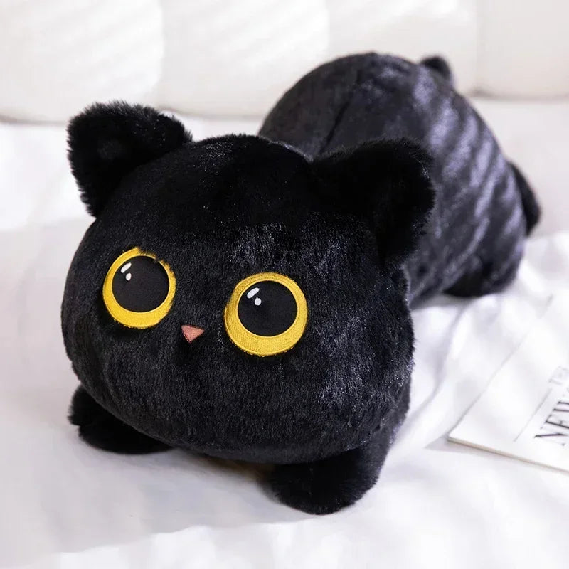 Black Cat Plush Pillow – Cute Kawaii Stuffed Animal Cushion Black cat plush toy with yellow eyes on a white surface