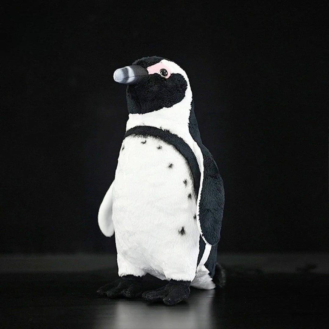 Realistic Penguin Plush Toy - Adélie Penguin Stuffed Animal Plush penguin toy on a black background