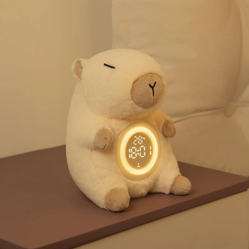 Capybara Plush Alarm Clock & Night Light – Adjustable Brightness Plush bear clock with digital display on a brown surface