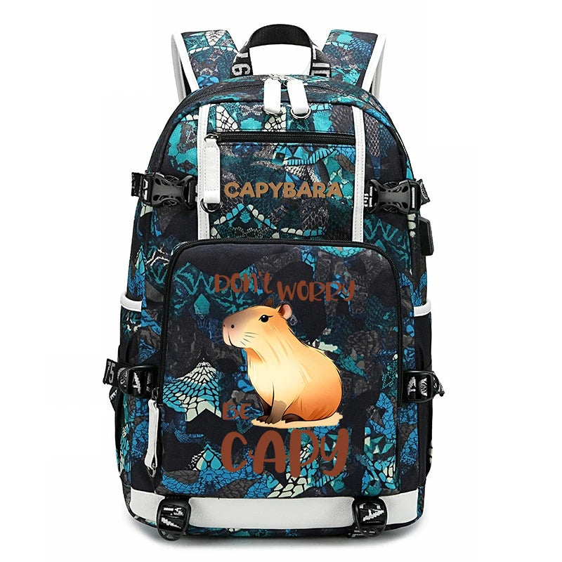 Capybara Backpack – Large Capacity Lightweight School Bag A patterned backpack with a cartoon hamster graphic and the text 'DON'T WORRY CARRY' on the front pocket, shown against a plain white background.