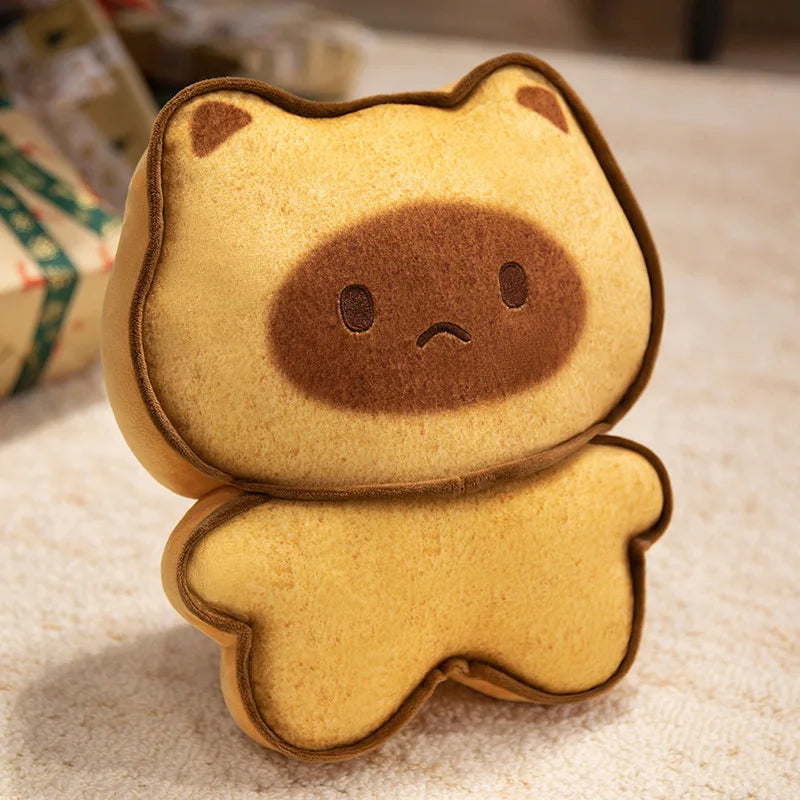 Capybara Bread Pillow – Cute Toast Plush Cushion Cute plush toy shaped like a bear with a sad face on a textured surface