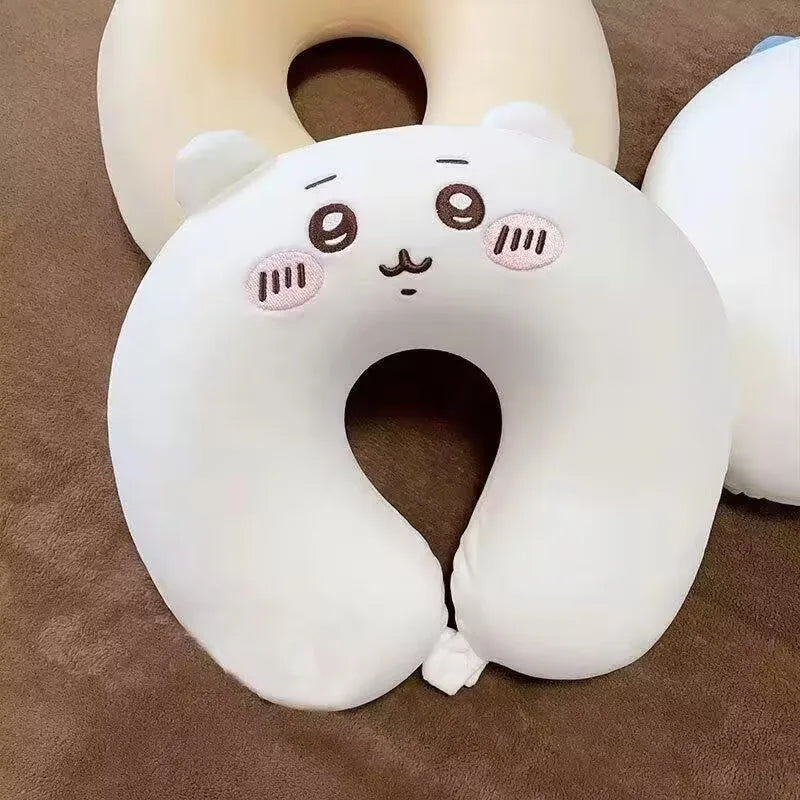 Cute Capybara U-Shaped Neck Pillow – Plush Travel Pillow U-shaped pillow with a cartoon face design on a brown background