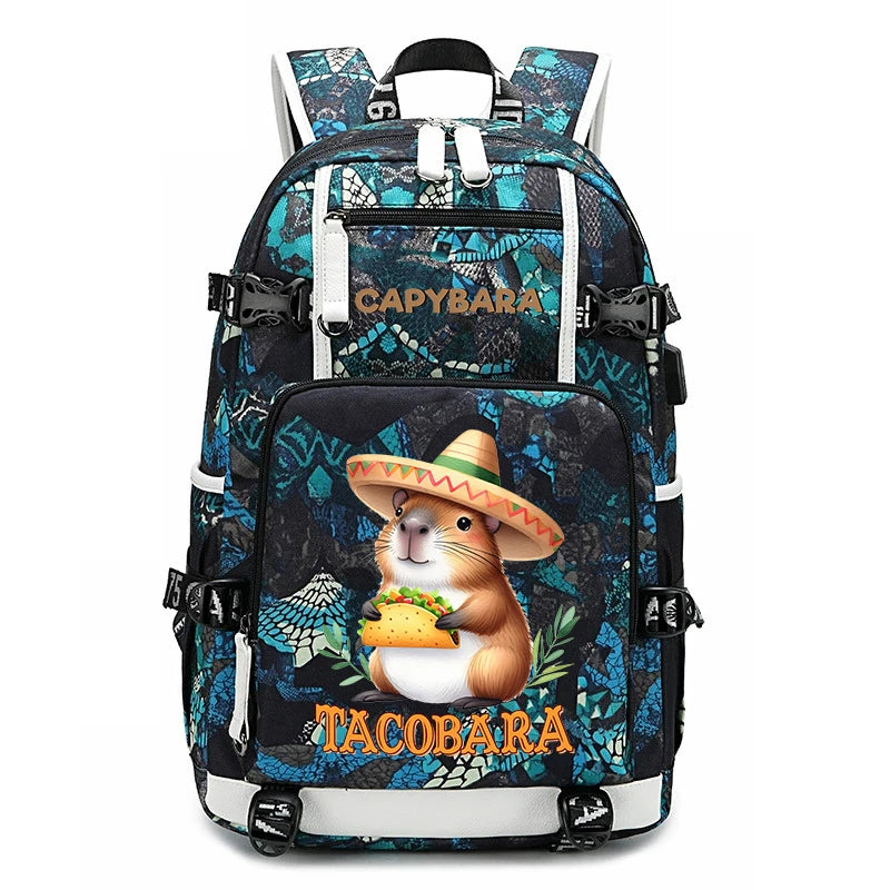 Capybara Backpack – Large Capacity Lightweight School Bag A backpack featuring a colorful Mexican-style pattern in blue, black, and teal, with a large front graphic of a guinea pig wearing a sombrero and holding a taco. The text 'Cadybara' is printed on the upper front, and 'Tacobara' is printed in orange on the lower front pocket.