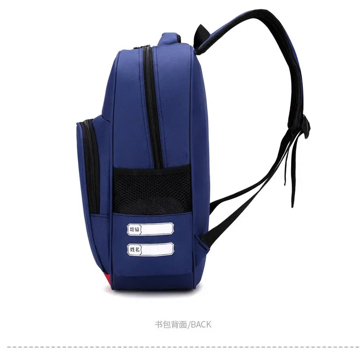 Pokemon Cartoon Backpack – Large Capacity School Bag A blue school backpack shown from the back, featuring a black mesh pocket, two white label slots with Chinese text, and a black shoulder strap, set against a plain white background.