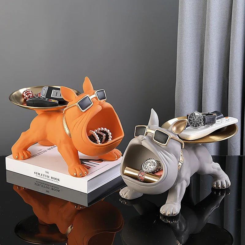 Bulldog Figurine with Storage Box – Resin Dog Home Decor Sculpture Two decorative dog figurines with accessories on a dark surface.