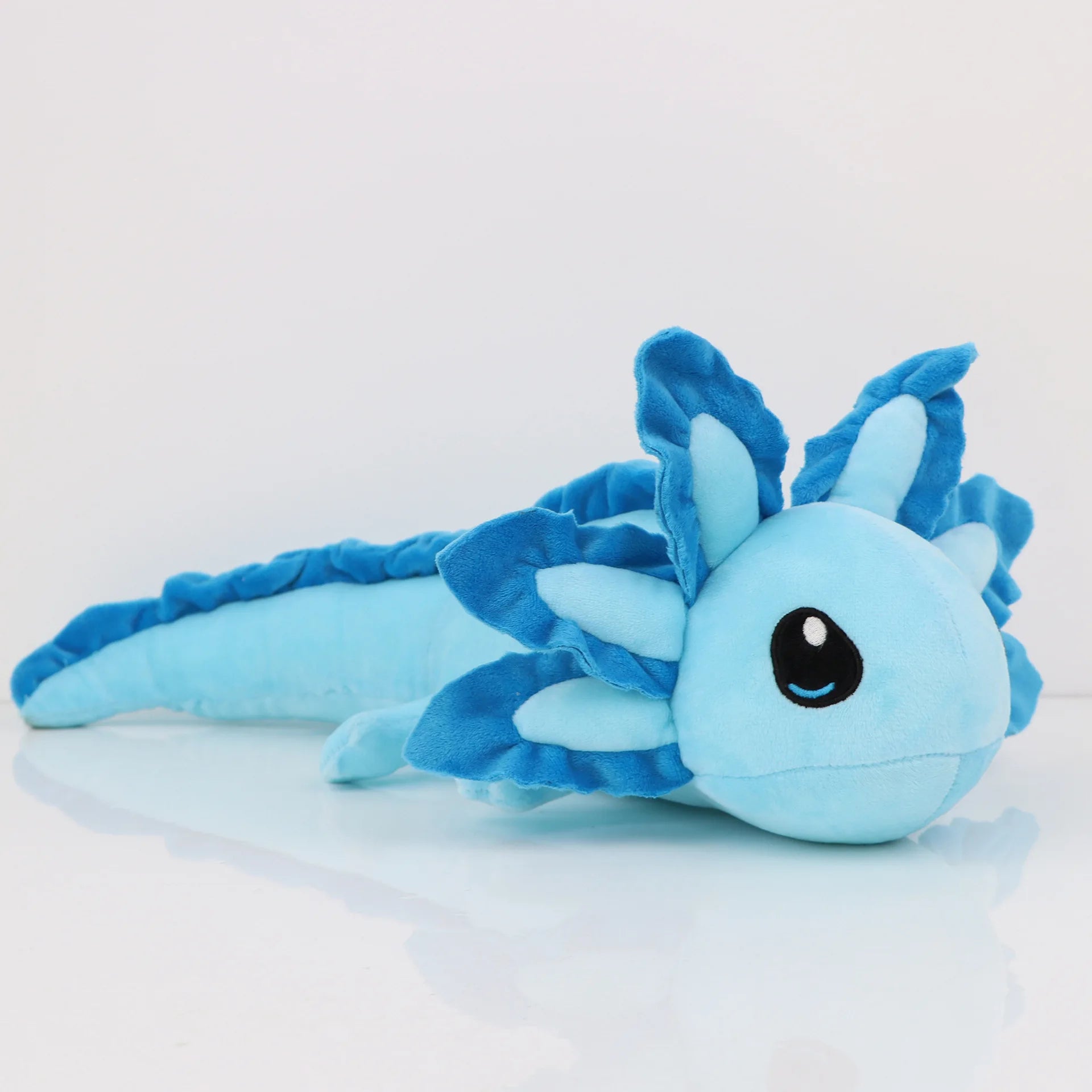 Axolotl Squishmallow Plush Toy – Soft Stuffed Animal Blue dragon-shaped plush toy on a white background