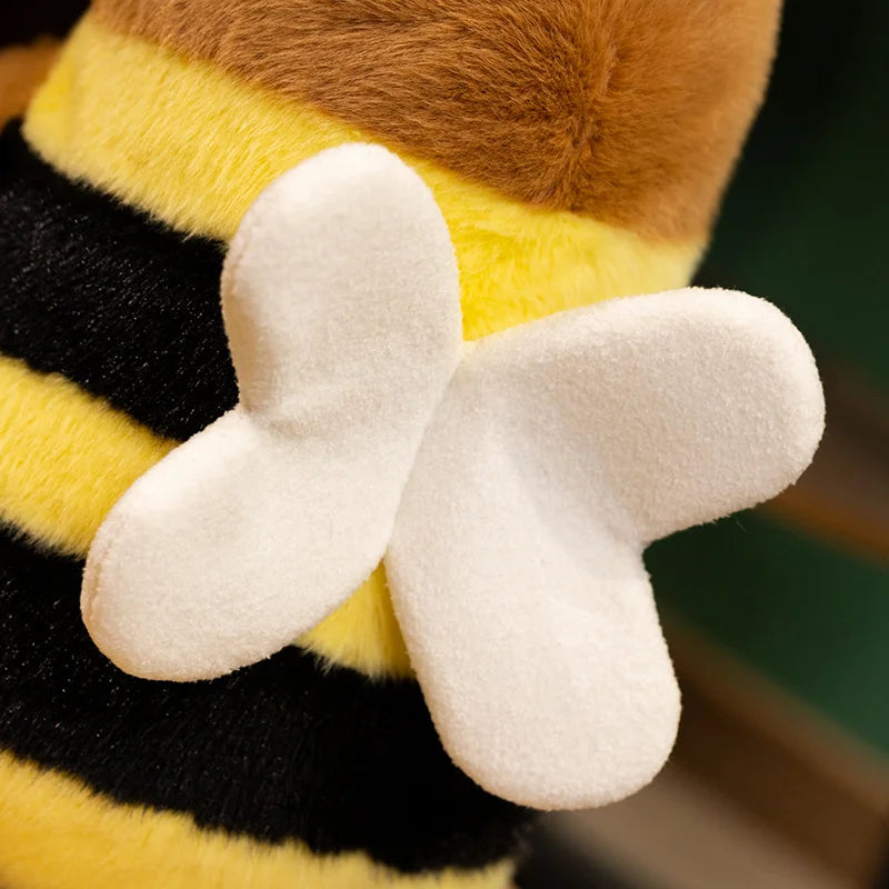 Bee Capybara Plush Toy – Kawaii Soft Stuffed Animal Close-up of a plush bee toy with yellow body, black stripes, and white wings.