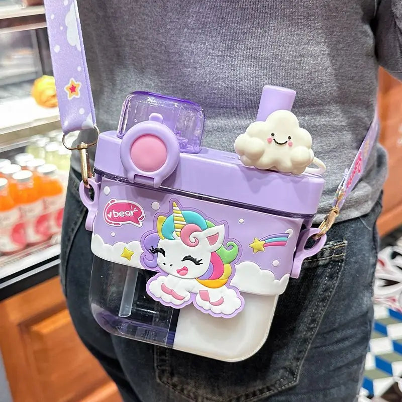 Capybara Kids Water Bottle – Cartoon Straw Cup A person wearing a purple and white cartoon unicorn crossbody water bottle bag with a strap, featuring a cute unicorn charm and a small cloud decoration.