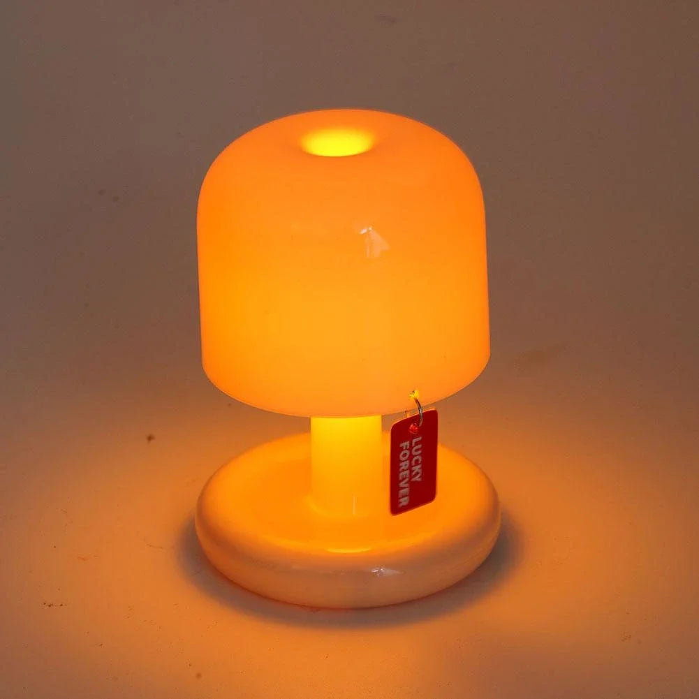 Orange Mushroom LED Night Light – Nordic Minimalist Table Lamp Orange lamp with a visible brand tag on a plain background