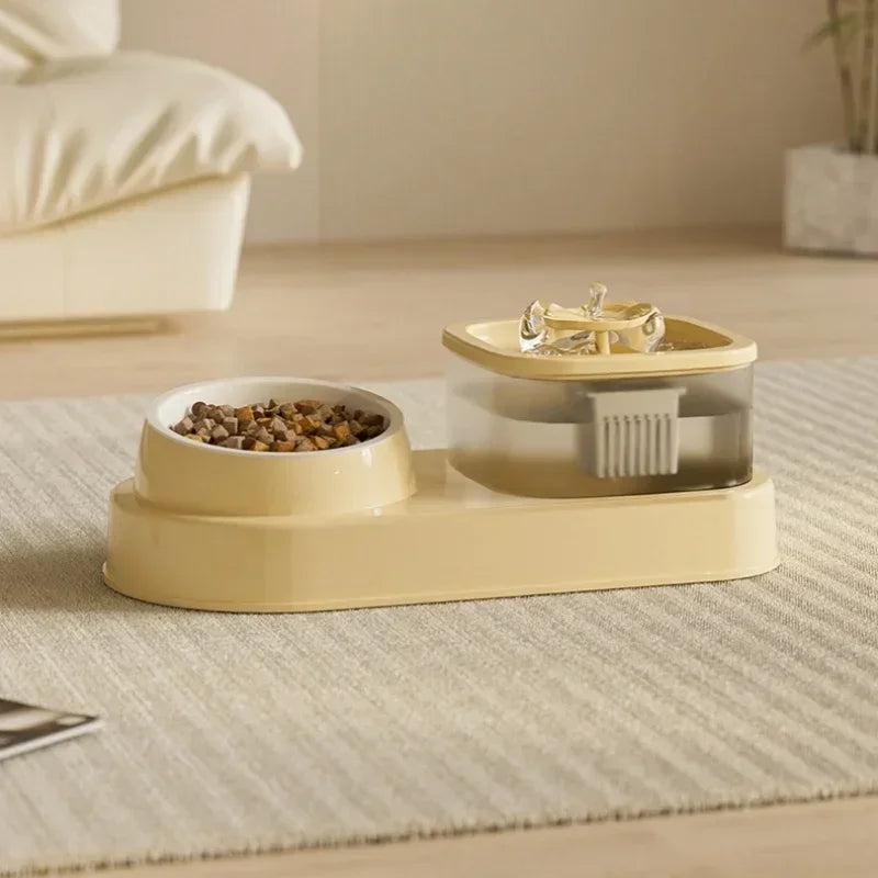 2 in 1 Cat Water Fountain Auto Filter USB Quiet Feeder Beige pet feeder with a transparent water dish on a textured surface.
